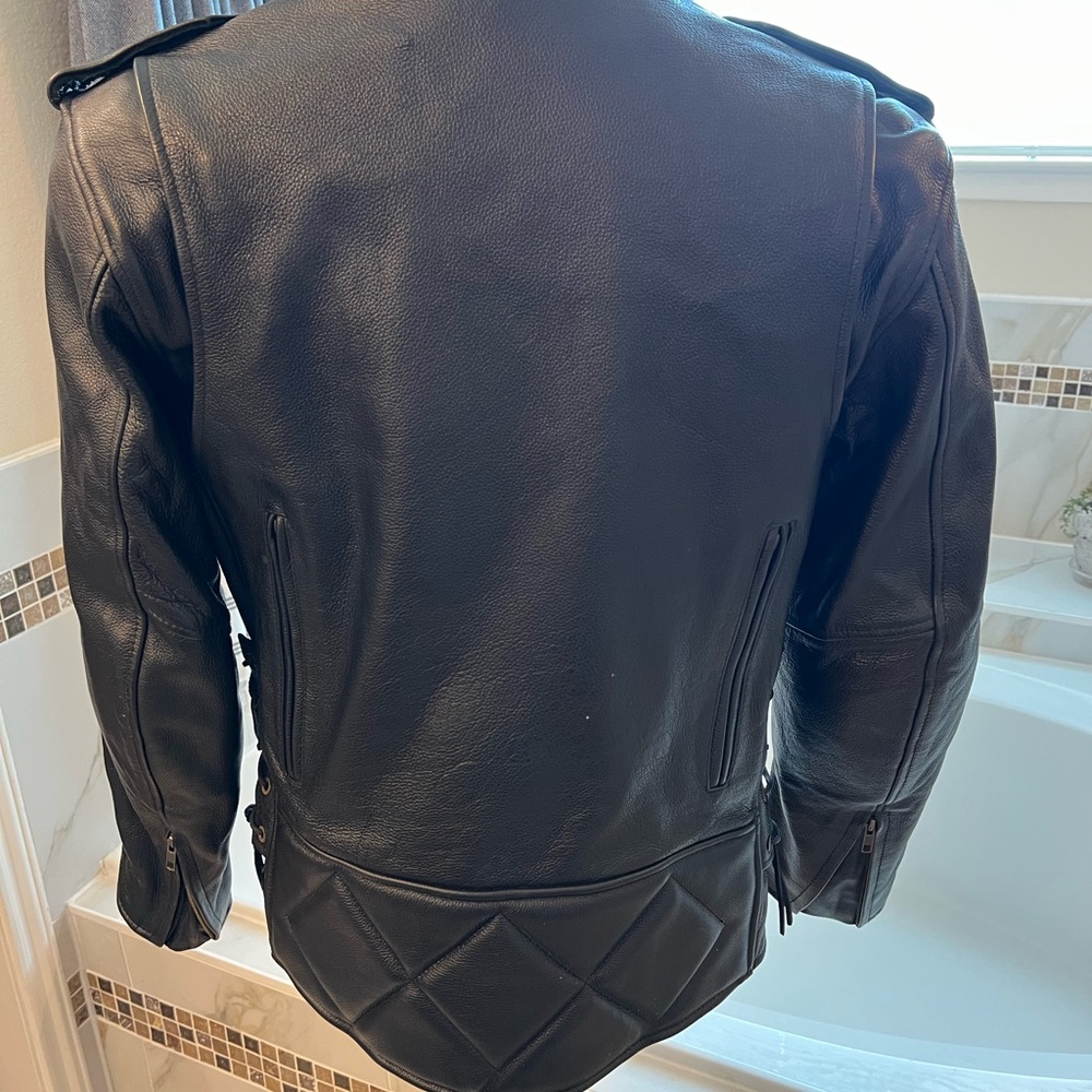 Black heavy leather riding jacket for women. - Picture 3 of 4